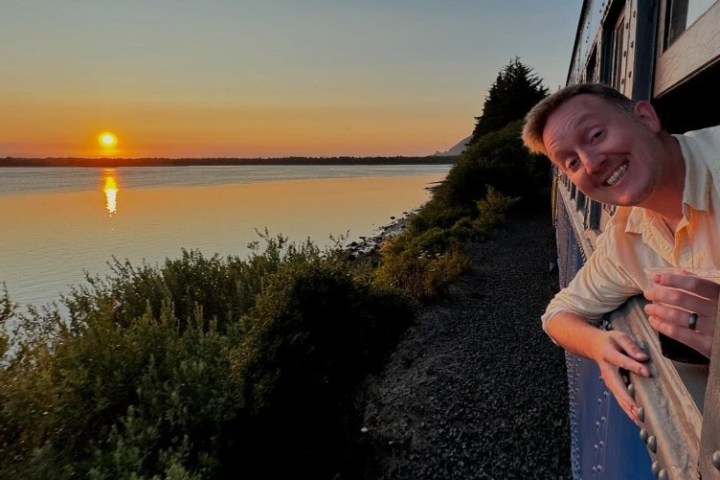 a young boy standing on a bridge
