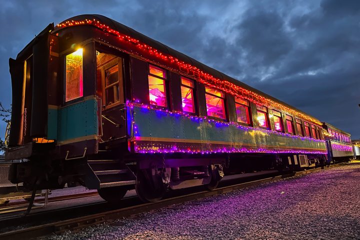 a train on the tracks at night